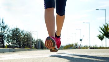 Feet running on street | Experienced Idaho Podiatry