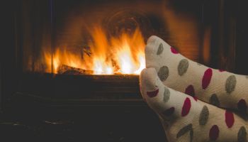 Feet sweating by a fire | Experienced Idaho Podiatrist
