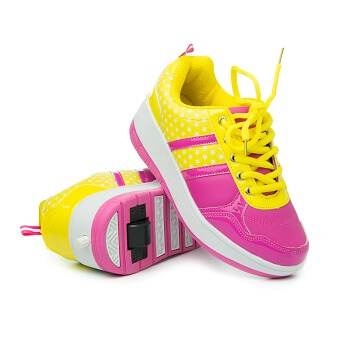 Child wearing Heelys wheeled shoes