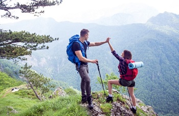 Two-hikers-on-top-of-rock