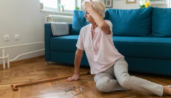 Woman on ground after fall | Experienced Idaho Podiatrist