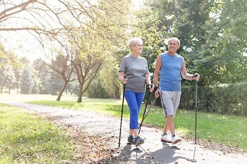 senior using custom orthotics for improved balance